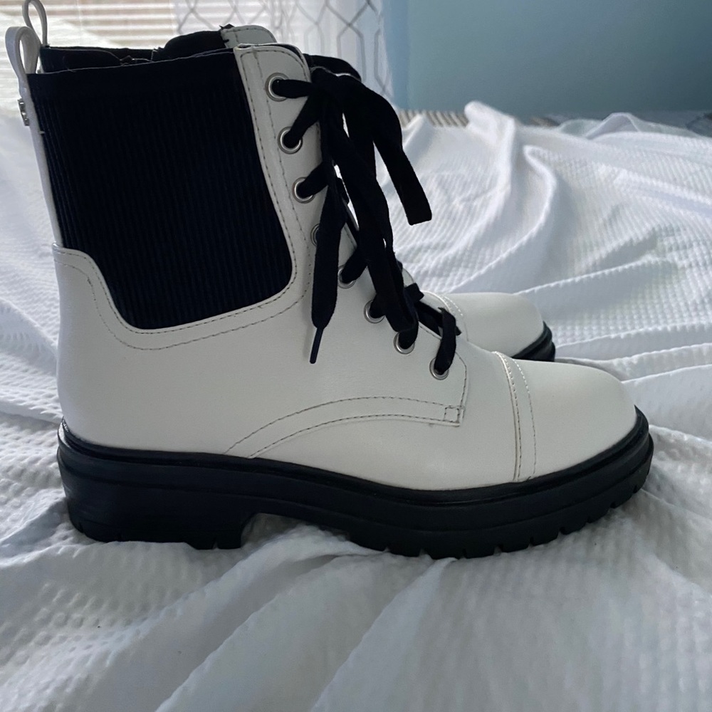 White boots with black trim